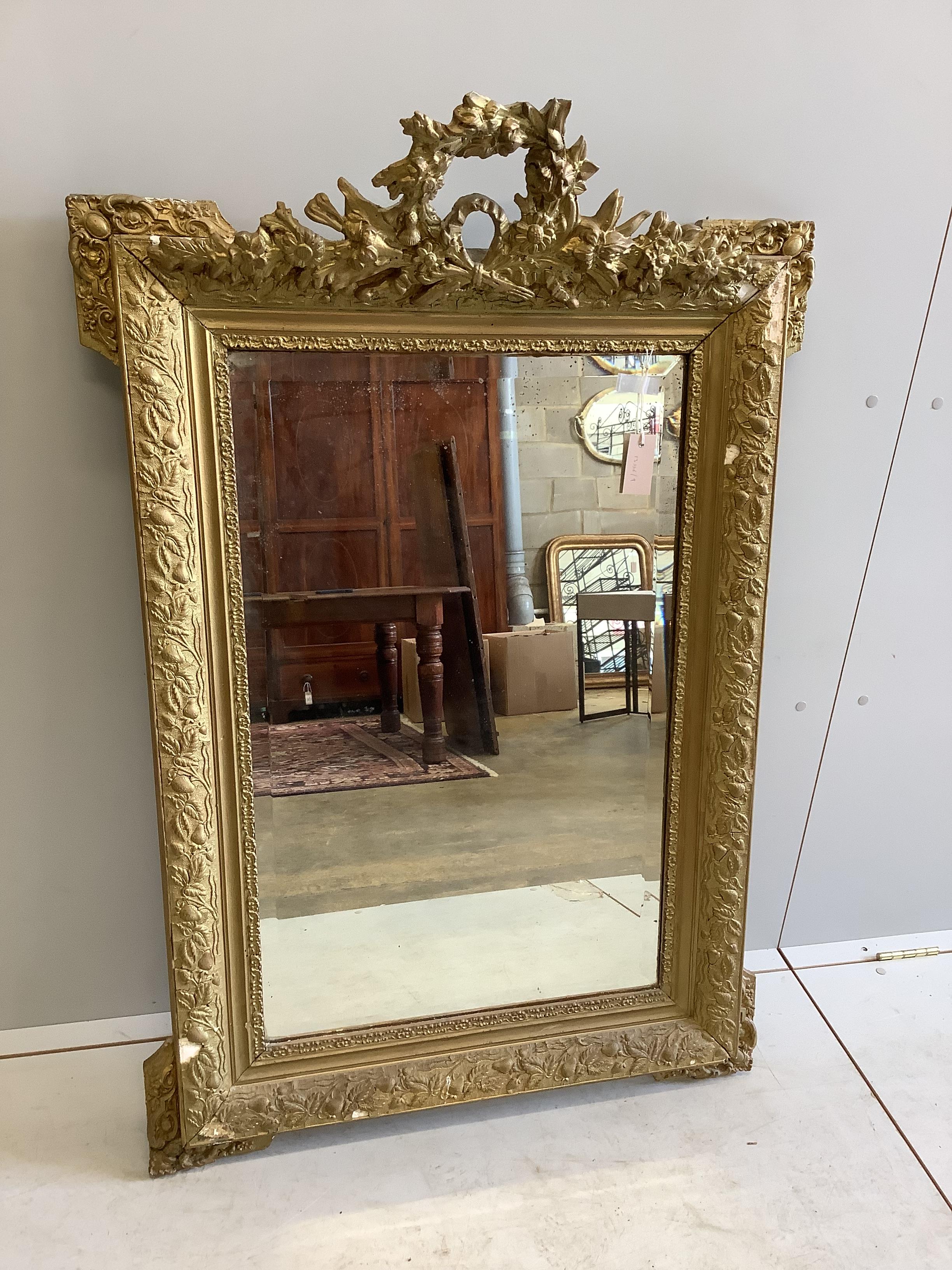 A late 19th century French giltwood and composition wall mirror, re-painted, width 81cm, height 122cm